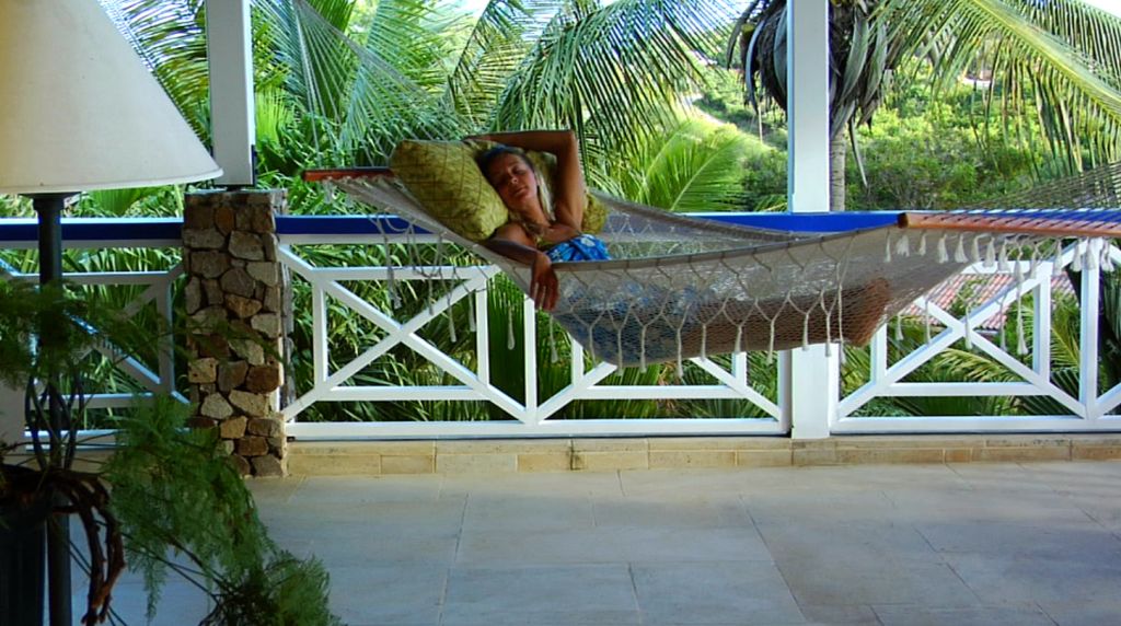 The Carib House, Antigua Villas: Woman relaxing on the hammock